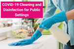 An individual is wearing rubber gloves and cleaning a counter surface